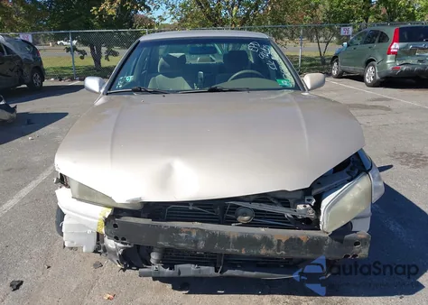 1999 Toyota Camry Le z USA, uszkodzony, nr VIN 4T1BG22K5XU394768